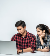 Students study happily using their laptops.